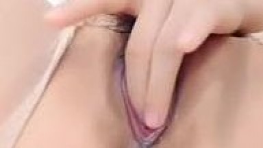 Sensual woman in stockings masturbates to orgasm, face visible. Close-up of her moaning provocatively while pleasuring herself, followed by a seductive shower.