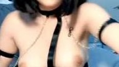 Cute and sexy young housewife dressed as a wildcat, wearing black stockings and showing her face. The kinky outfit and small breasts are very stimulating. She has a shaved pussy, milky coquettish buttocks, and a vibrating egg inserted in her vagina while 