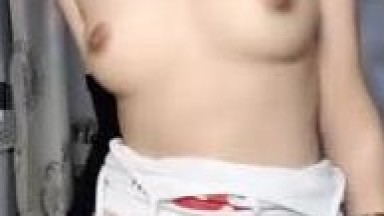 Goddess Alert: A stunning goddess in white stockings puts on a titillating live show for her fans, flaunting her perky, round breasts and offering close-up views of her pussy while moaning suggestively.