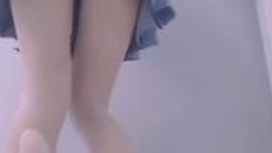 Schoolgirl in white stockings masturbates to orgasm